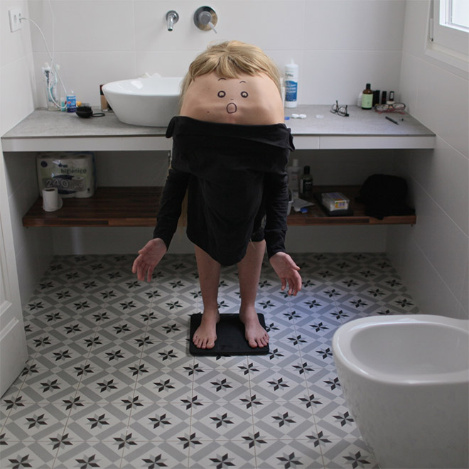 Artist Creates Creepy Creatures by Drawing Faces On People’s Backs