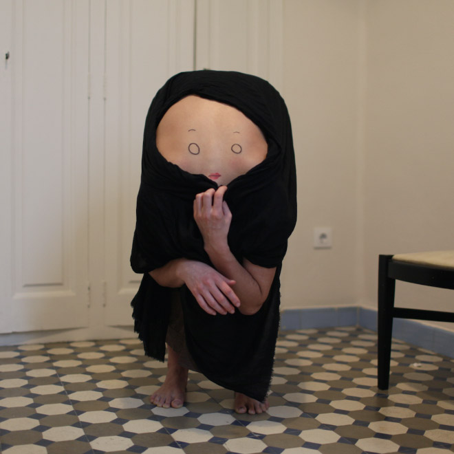 Artist Creates Creepy Creatures by Drawing Faces On People’s Backs