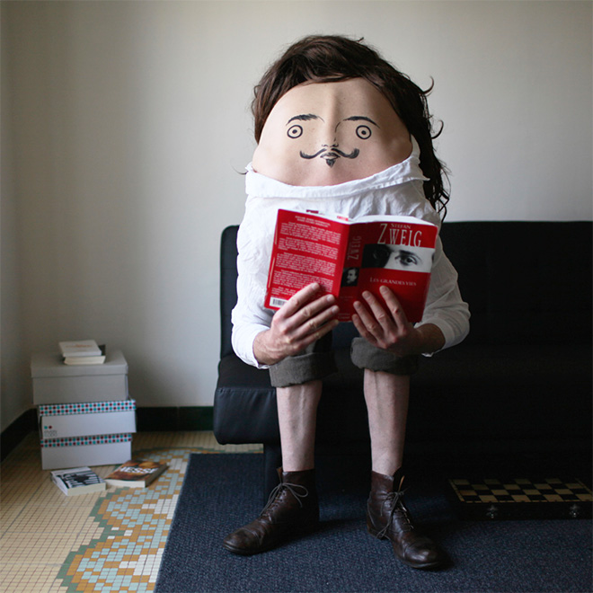 Artist Creates Creepy Creatures by Drawing Faces On People’s Backs