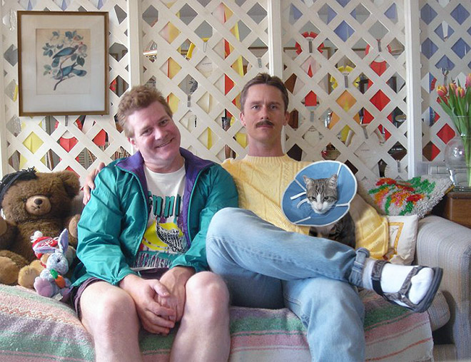The World’s Greatest Photos of Men Posing With Cats