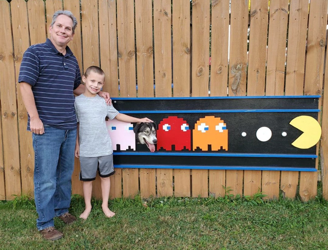 These Guys Make Neighborhood Laugh With Creative Fence Windows For Dogs