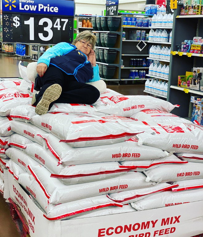 Walmart Keeps Posting Pictures of This Employee Posing With Stuff, She Goes Viral