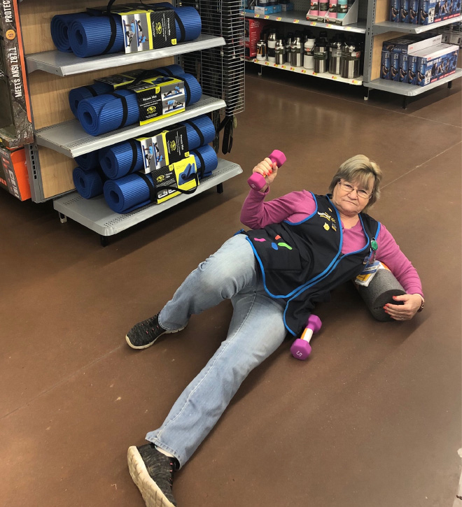 Walmart Keeps Posting Pictures of This Employee Posing With Stuff, She Goes Viral