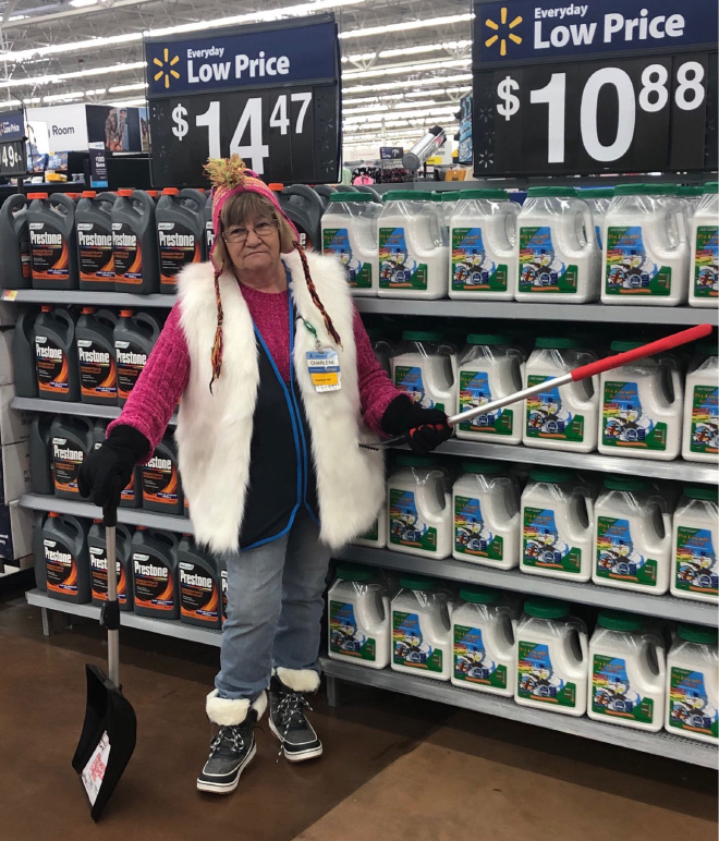 Walmart Keeps Posting Pictures of This Employee Posing With Stuff, She Goes Viral