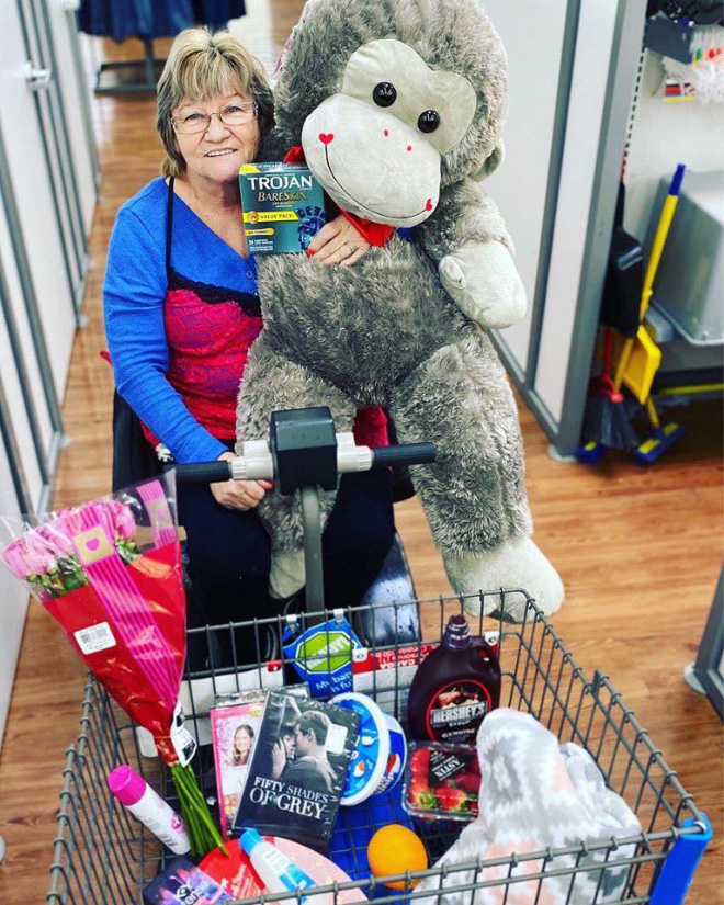 Walmart Keeps Posting Pictures of This Employee Posing With Stuff, She Goes Viral
