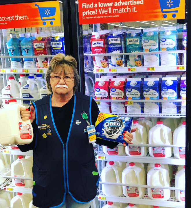 Walmart Keeps Posting Pictures of This Employee Posing With Stuff, She Goes Viral