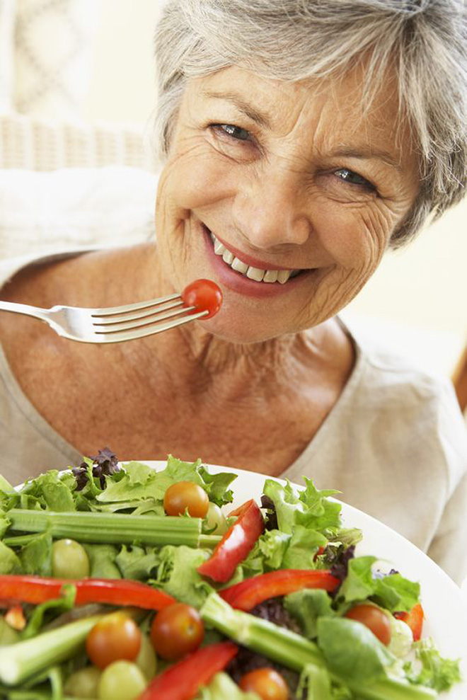 Women Laughing Alone With Salad