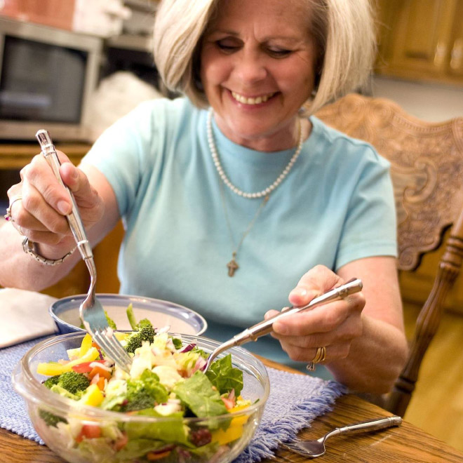 Women Laughing Alone With Salad