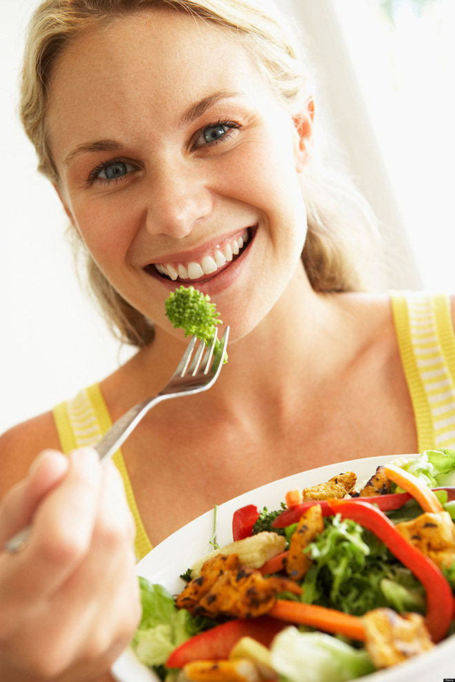 Women Laughing Alone With Salad