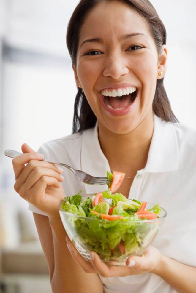 Women Laughing Alone With Salad