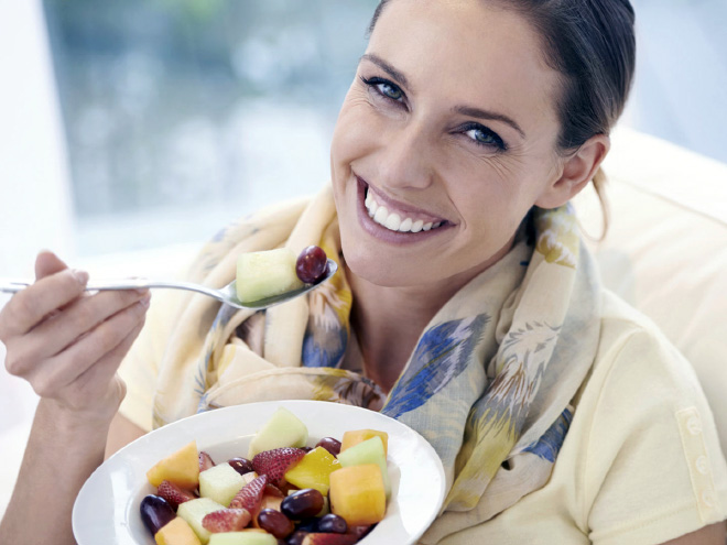Women Laughing Alone With Salad