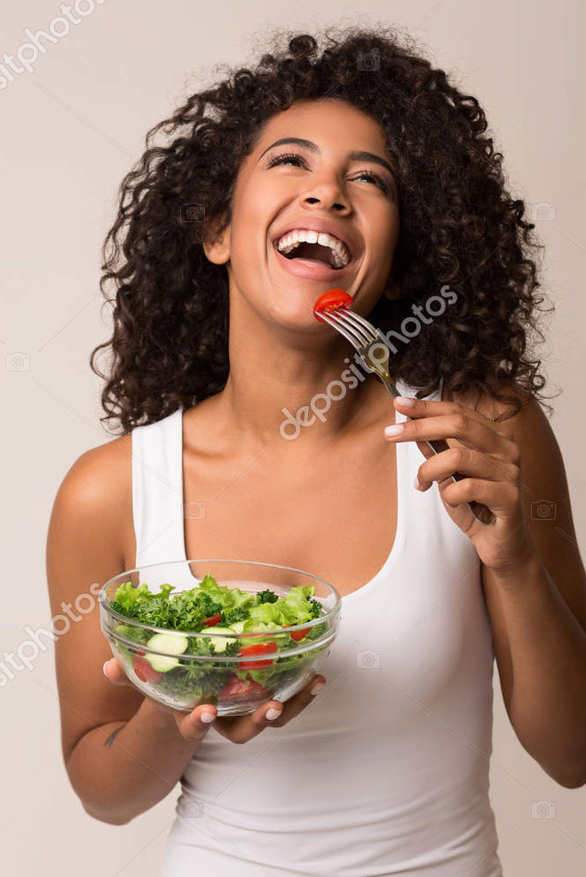 Women Laughing Alone With Salad
